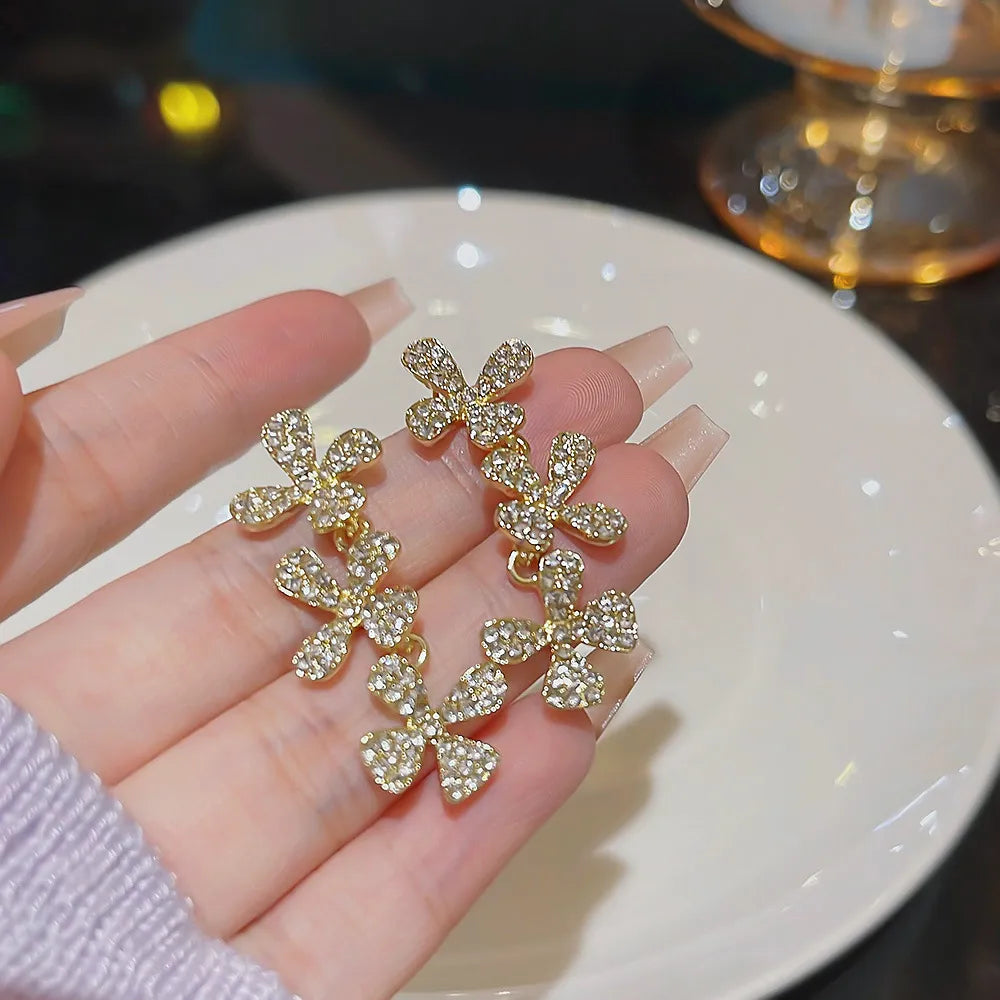 Golden Muse Bow Earrings