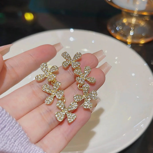 Golden Muse Bow Earrings